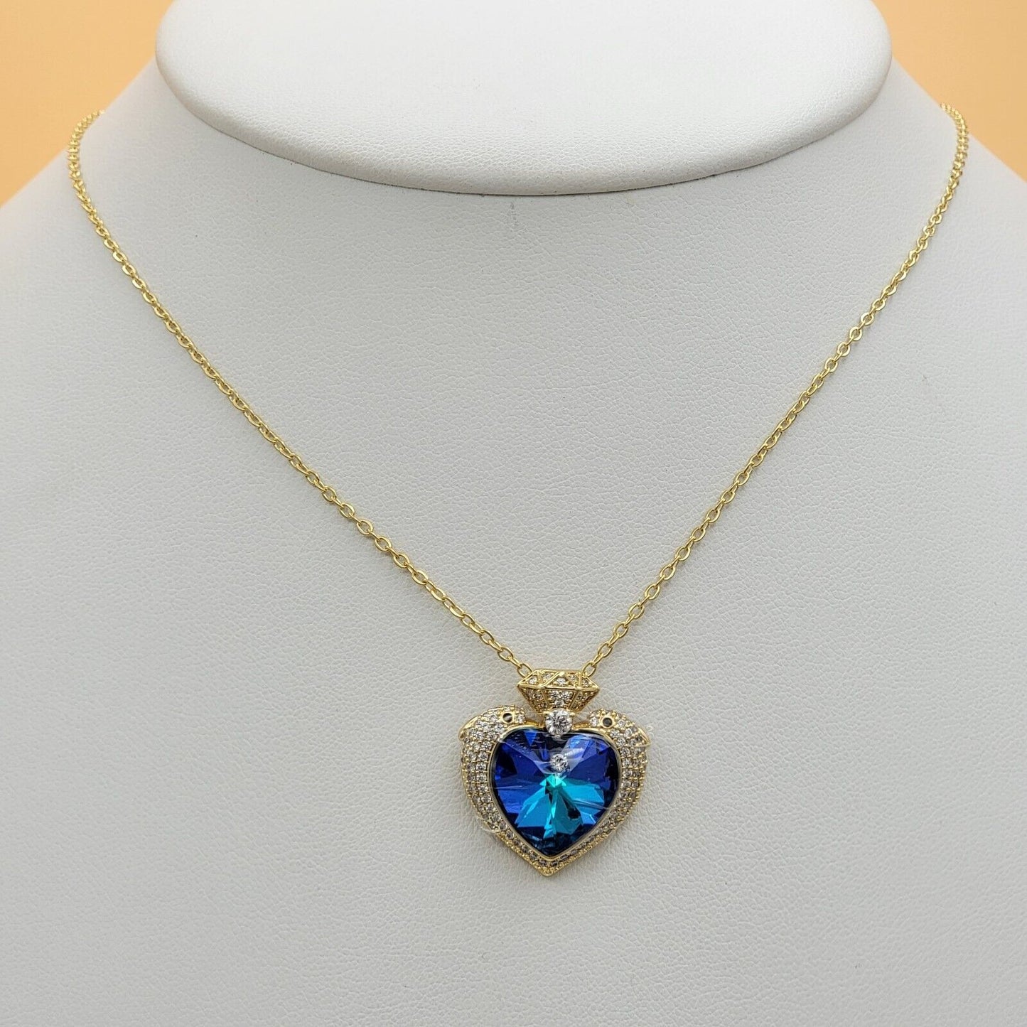 Necklaces - 14K Gold Plated. Blue Crystal Dolphins Heart Pendant & Chain.