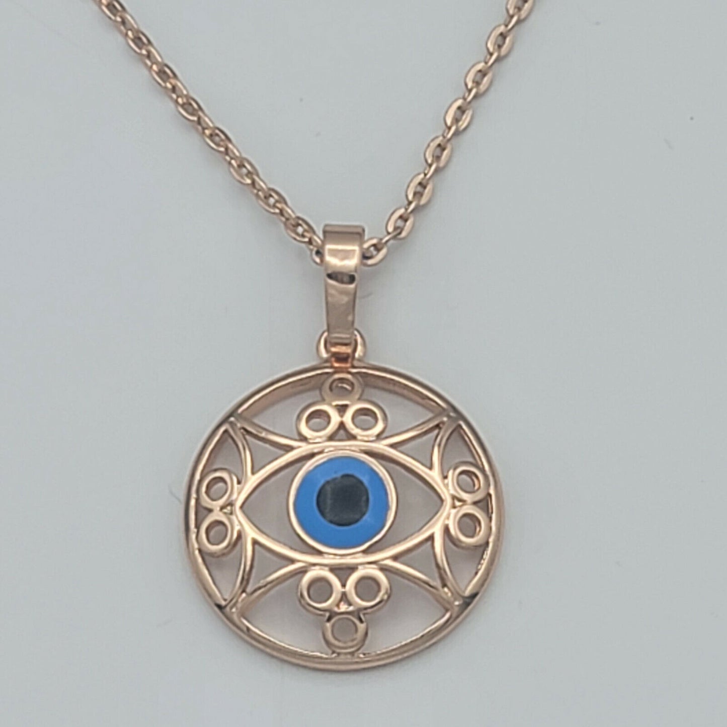 Necklaces - Rose Gold Plated. Blue Eye Pendant & Chain.