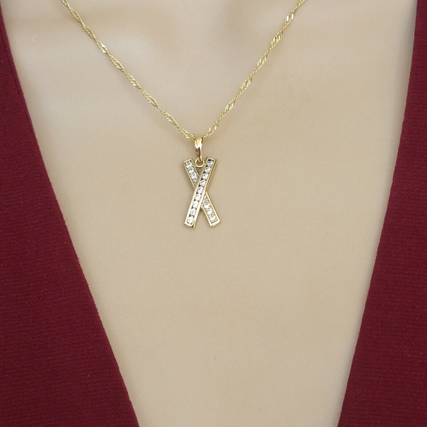 Necklaces - 14K Gold Plated. Icy crystal X Cross Ribbon Pendant & Chain.