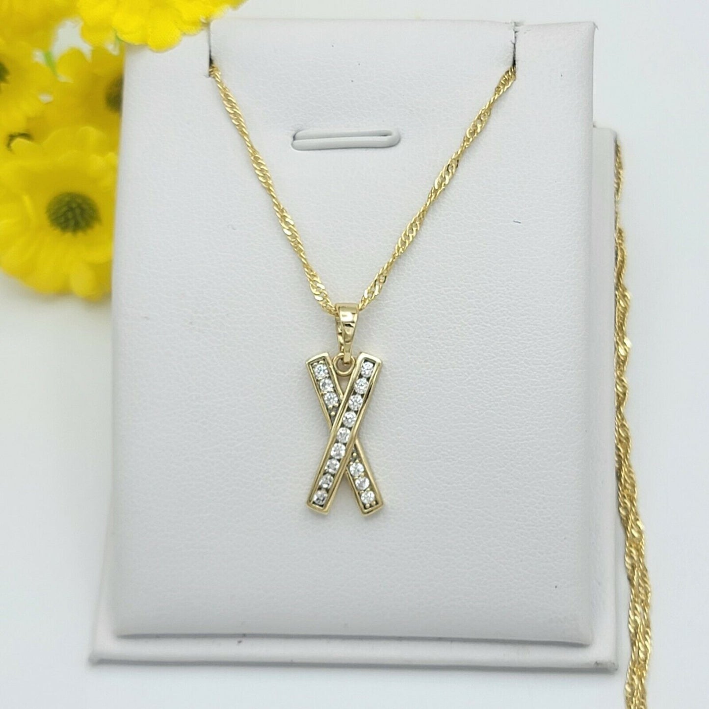 Necklaces - 14K Gold Plated. Icy crystal X Cross Ribbon Pendant & Chain.