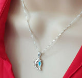 Solid 925 Sterling Silver. Opal Blue Dolphin CZ Pendant & Chain.